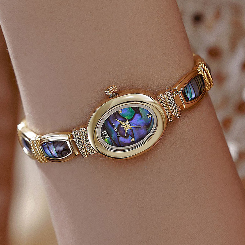 البيضاوي الهاتفي النساء ساعات  - مراجعة Luxury Watch Unique وسعره