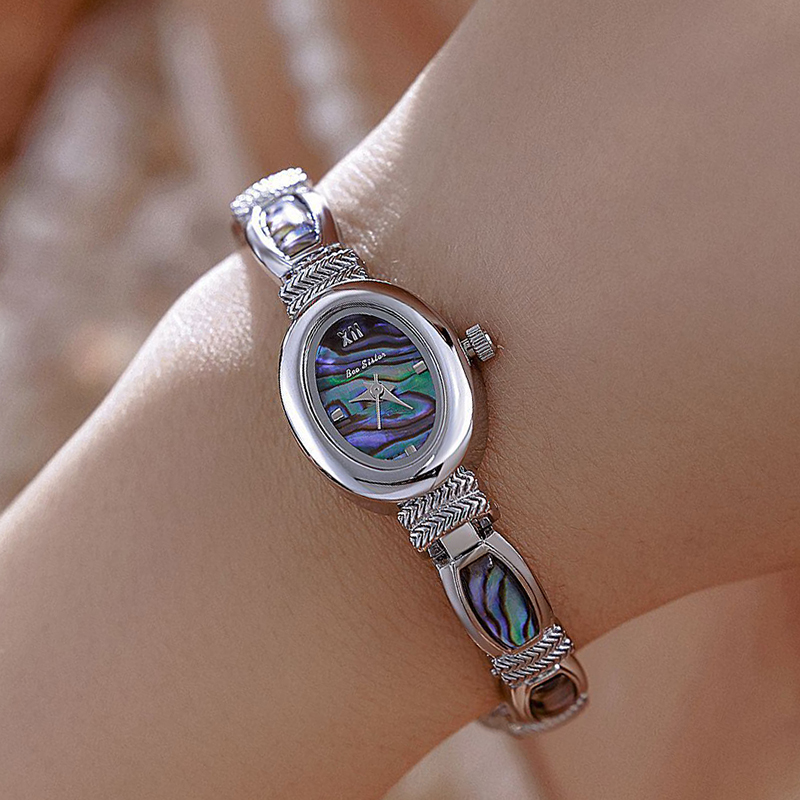 البيضاوي الهاتفي النساء ساعات  - مراجعة Luxury Watch Unique وسعره